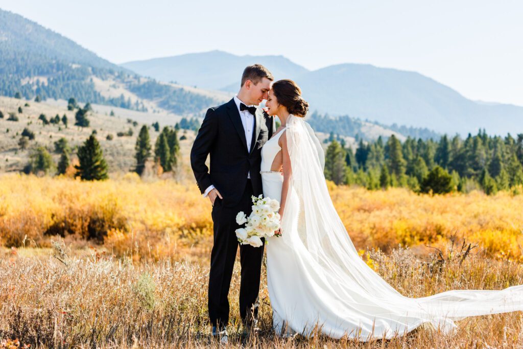 romantic bride and groom photo in big sky, mt in the fall