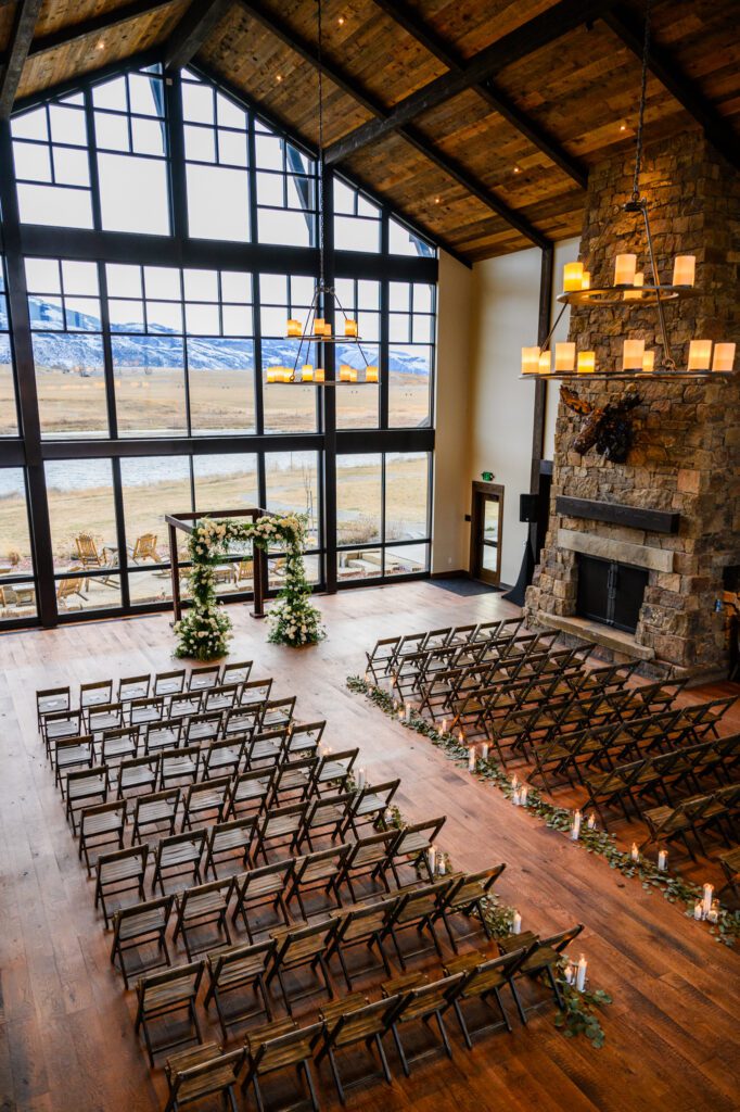 indoor rustic wedding reception setup in Sage Lodge