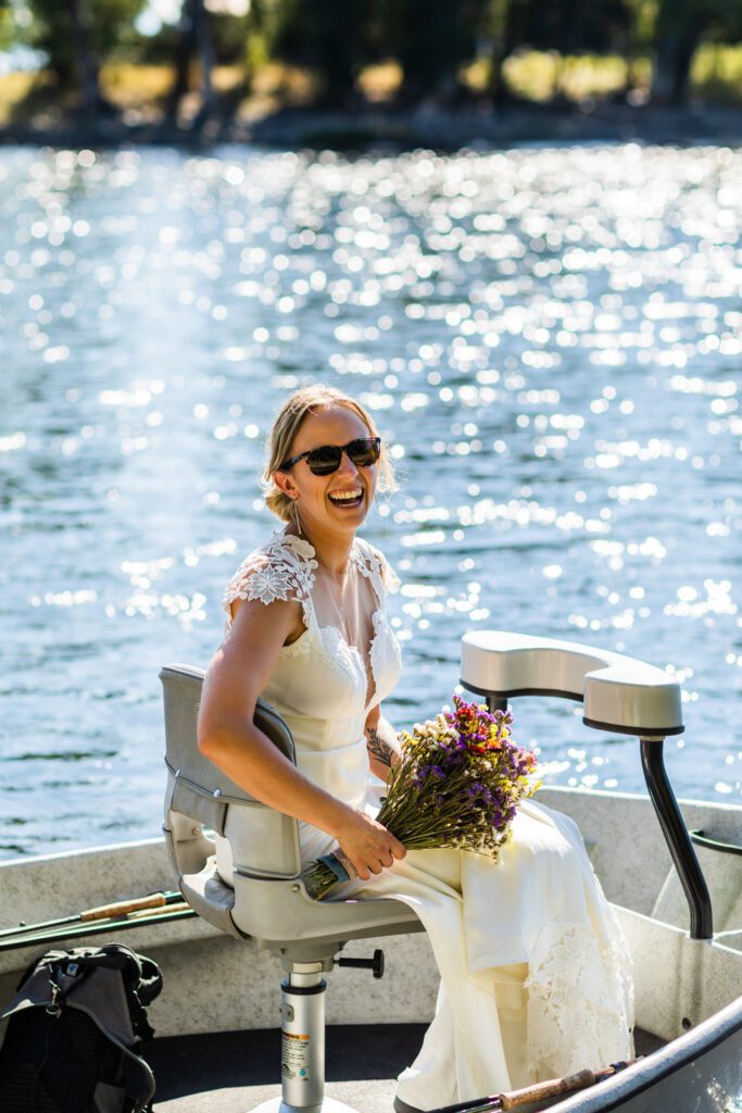 bride in drift boat on the river